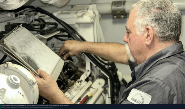 marine diesel service cost South Florida — Scarano Marine factory-certified MAN technician working on marine diesel engine