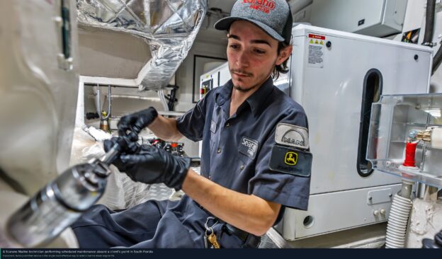 extend marine diesel engine life South Florida — Scarano Marine technician performing scheduled maintenance aboard a client's yacht.